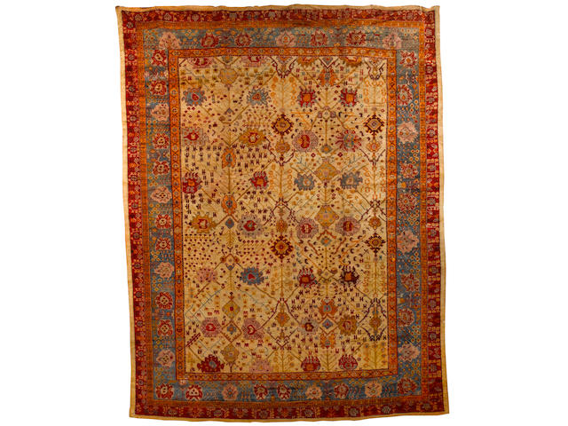 An Ushak carpet West Anatolia, 14 ft 6 in x 11 ft 3in (444 x 343 cm)