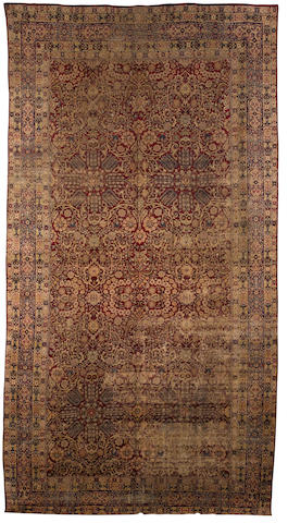 A Kirman carpet South East Persia, 18 ft x 10 ft (550 x 305 cm) reduced in size