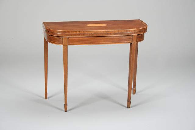 A George III mahogany D shaped card table