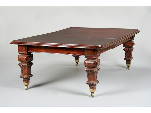 A large late Victorian mahogany extending dining table,