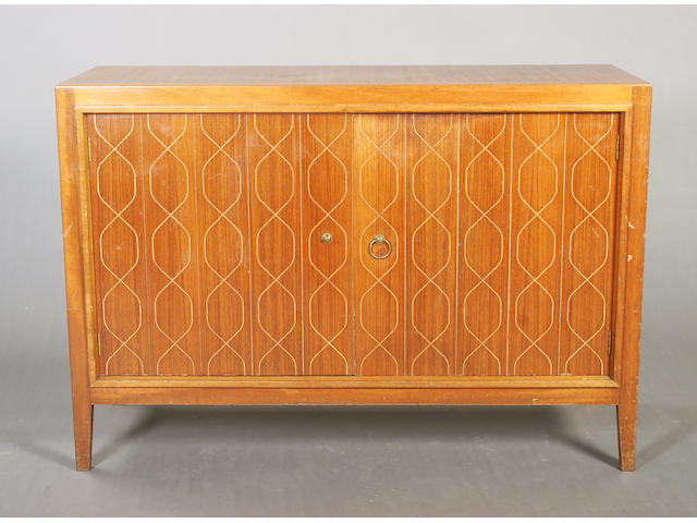 A Gordon Russell mahogany double helix sideboard, designed by David Booth in 1950 for the Festival of Britain, 1951