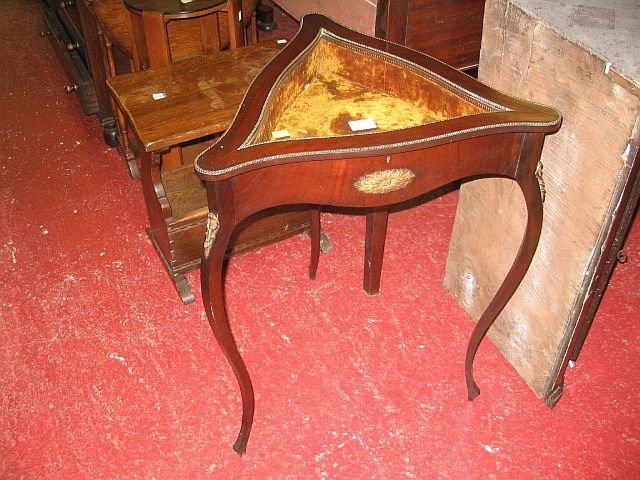 A triangular shaped display table