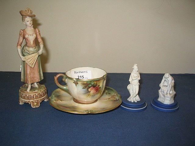 A Royal Worcester 'Hadley Ware' teacup and saucer