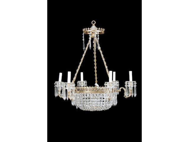 A Regency and later cut glass and brass tent and bag six light chandelier