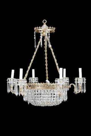 A Regency and later cut glass and brass tent and bag six light chandelier