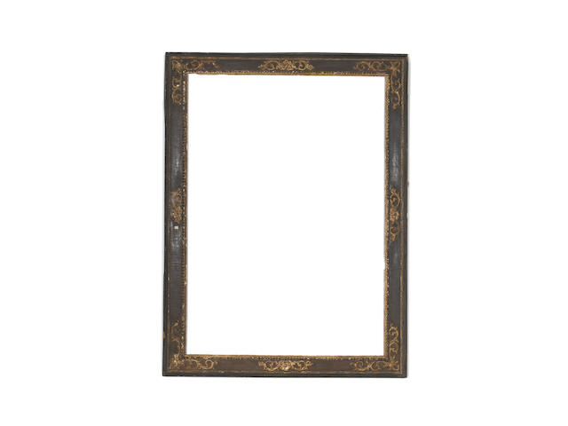 An Italian 17th Century parcel gilt and red painted cassetta frame