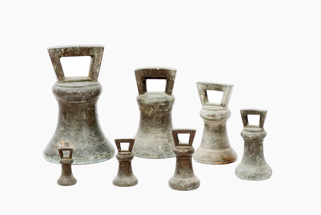 A set of seven George IV bell weights,