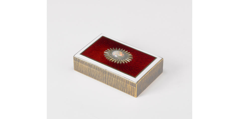GERALD BENNEY : A silver-gilt and enamelled rectangular box, London 1974, the base with master ename