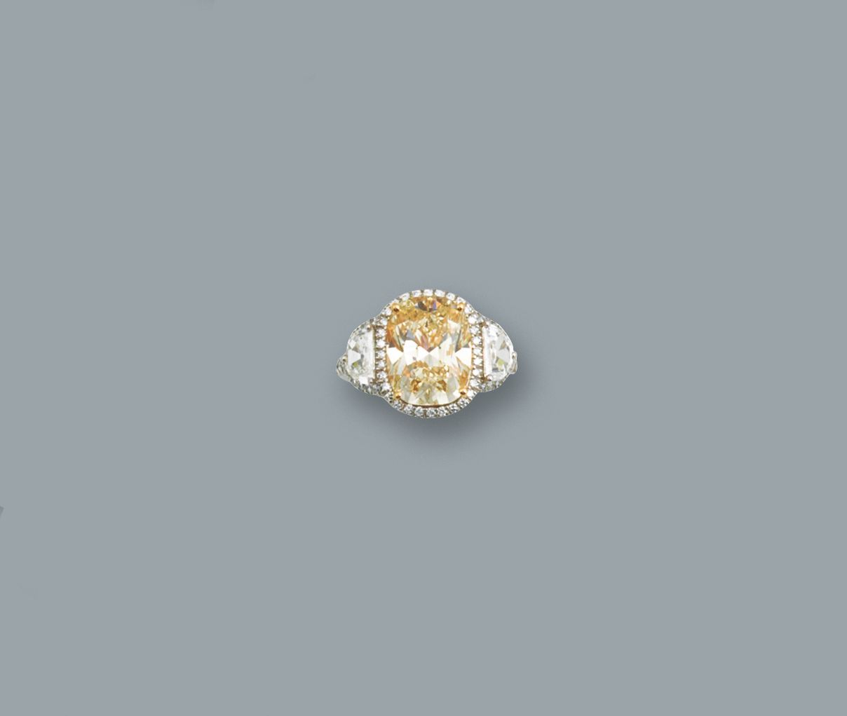 A coloured diamond ring
