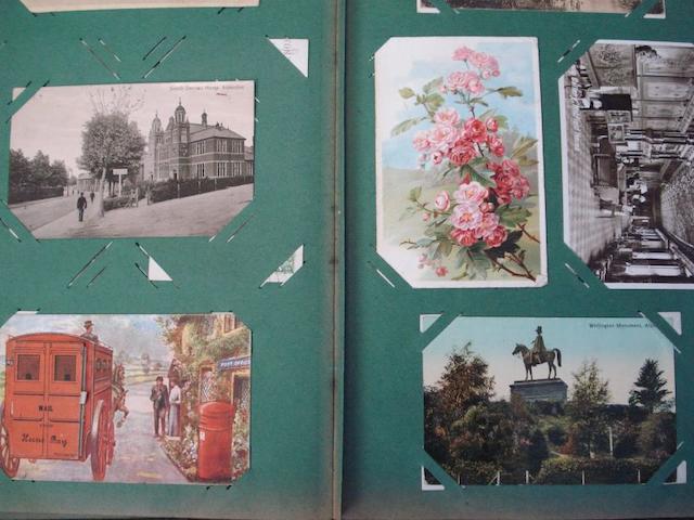 An album of assorted postcards