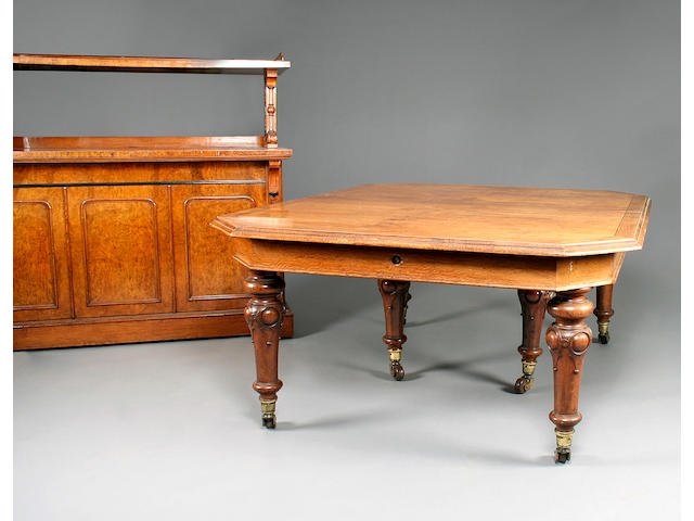 A large mid Victorian oak extending dining table