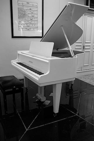 A 5ft 4in Model 160 grand piano