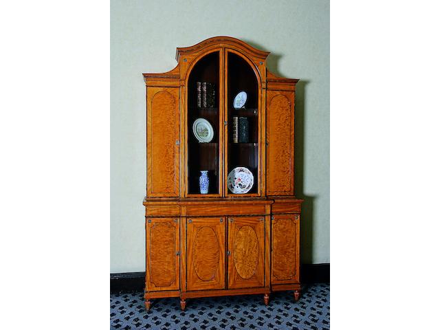 An Edwardian satinwood and rosewood banded bookcase