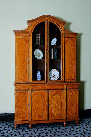 An Edwardian satinwood and rosewood banded bookcase