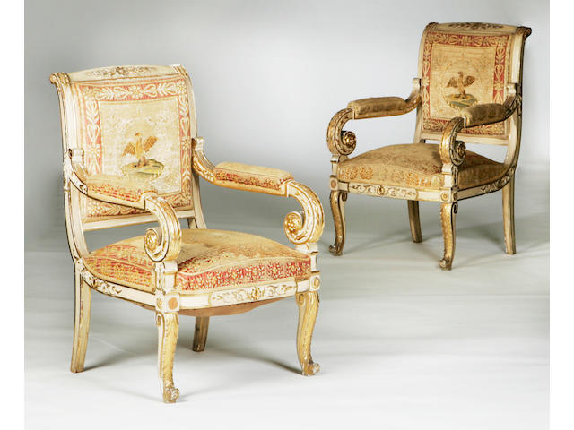 A pair of mid 19th century giltwood and gesso armchairs