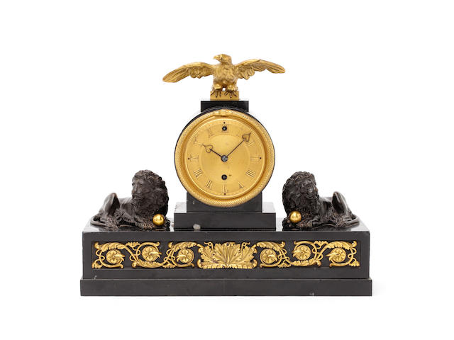 A rare early 19th century patinated and gilt bronze-mounted slate mantel timepiece.  Originally sold to Robert La Touche Esquire for 48 guineas on 6th July 1811 Vulliamy, London, number 483