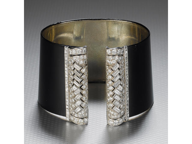 A fine and rare art deco black lacquer and diamond cuff bangle, by Cartier,