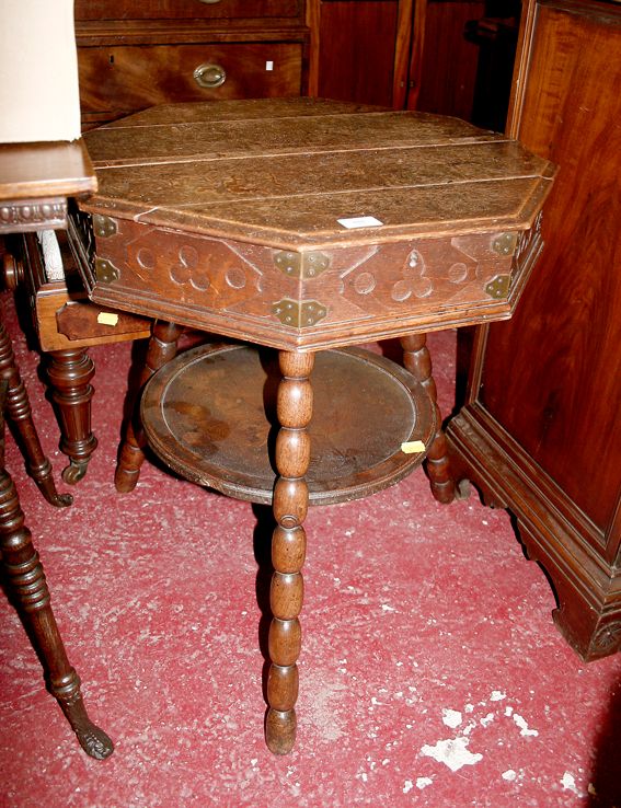 An oak octagonal sewing table