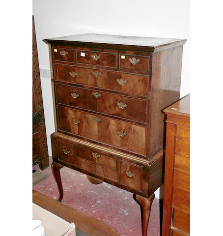A George II walnut chest on stand