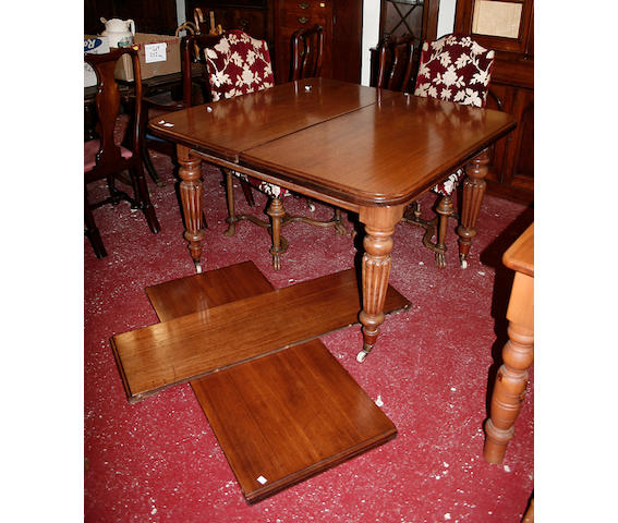 A mid Victorian mahogany extending dining table