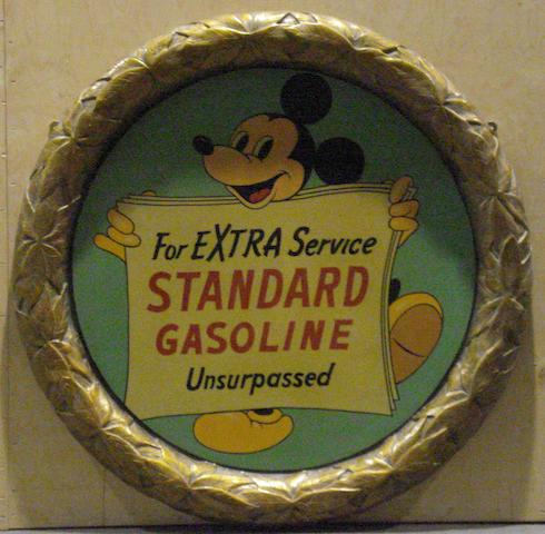 A raised laurel leaf Standard Gasoline advertising plaque,