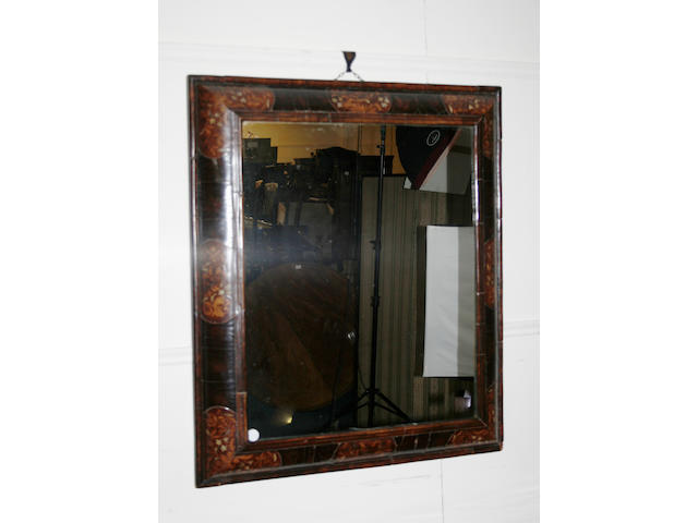 An 18th century walnut framed wall mirror