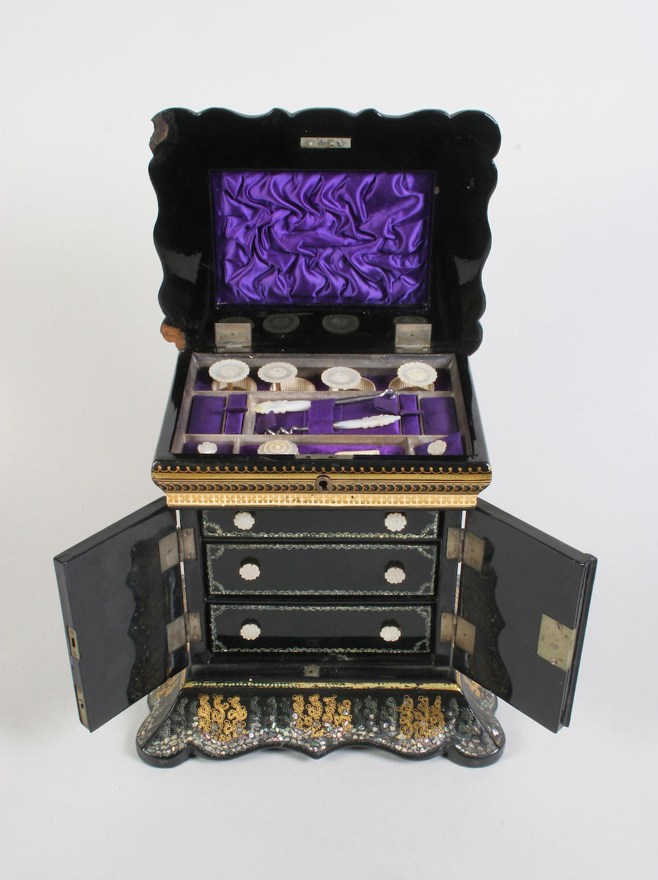 A good Victorian papier-mache table casket fitted for sewing