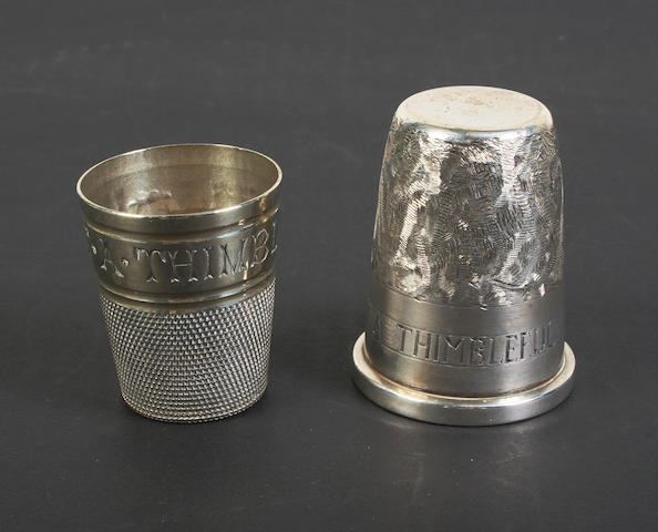 A silver thimble measure and a plated example