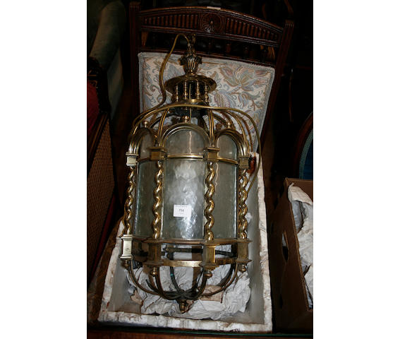 An early 20th century brass hanging hall lantern,