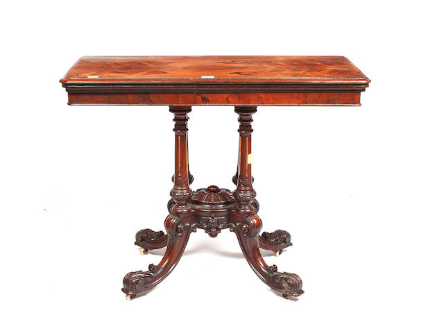 A 19th century rosewood card table