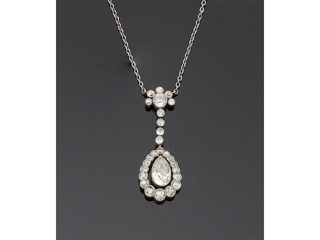 An early 20th century diamond pendant in original fitted case by Parkes, London
