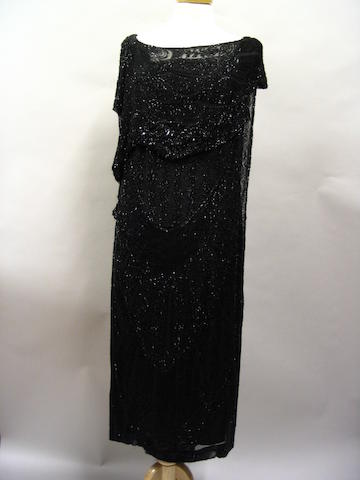 A 1920s black beaded flapper dress