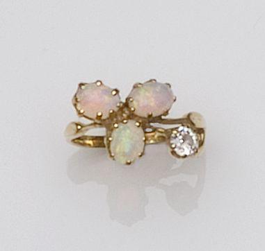 An opal and diamond dress ring