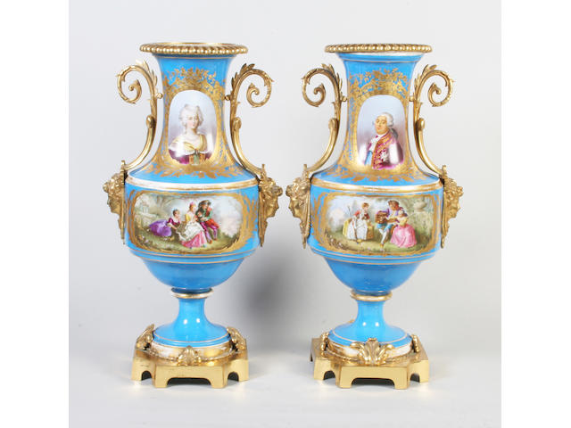 A pair of ormolu mounted S&#232;vres-style vases