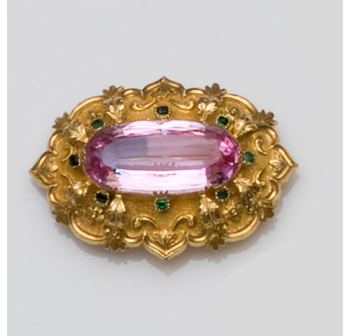 An early Victorian pink topaz and emerald brooch