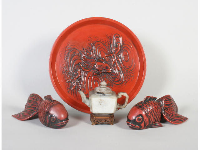 A pair of red lacquer fish boxes and covers, a tray and a jade teapot and cover Late 19th-20th Century
