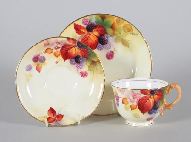 A Royal Worcester trio by Kitty Blake Dated 1937