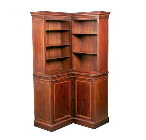 An early 20th century Edwards and Roberts mahogany corner bookcase