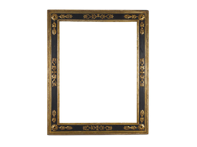 An Italian late 16th Century parcel gilt and black painted cassetta frame