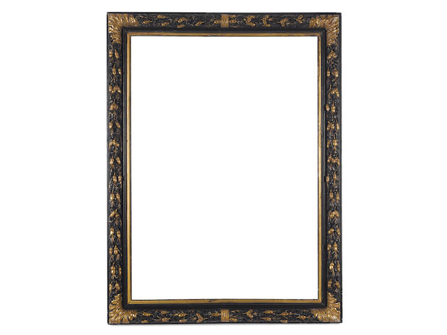 A Italian 17th Century carved and parcel gilt frame
