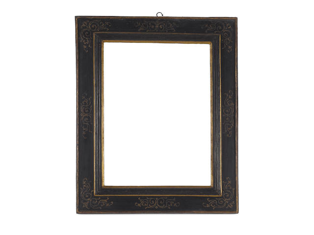 A Tuscan 16th Century ebonised and parcel gilt cassetta frame