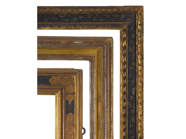 A Tuscan late 16th Century carved, ebonised and parcel gilt cassetta frame