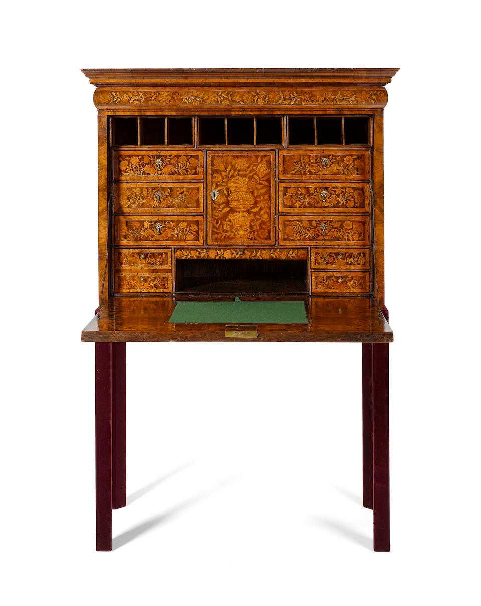 A William and Mary walnut, crossbanded and floral marquetry Escritoire on later Stand