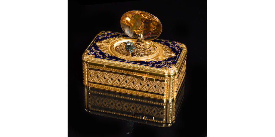 A fine gold and enamel singing bird box by Brugier, full size,