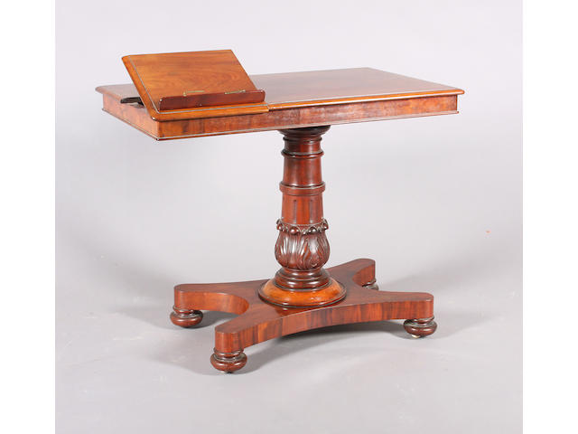 An early Victorian mahogany adjustable reading table