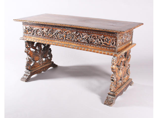 An Italian carved walnut rectangular centre table in the 16th/17th century style