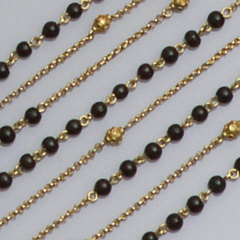 A long fine belcher-link chain necklace