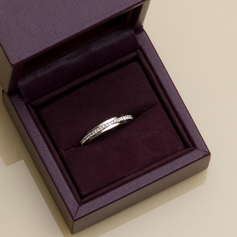 A diamond swivel eternity ring, by Asprey