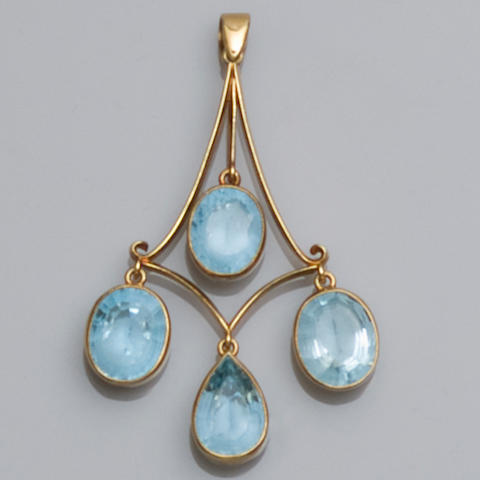 An 18ct gold blue topaz set pendant