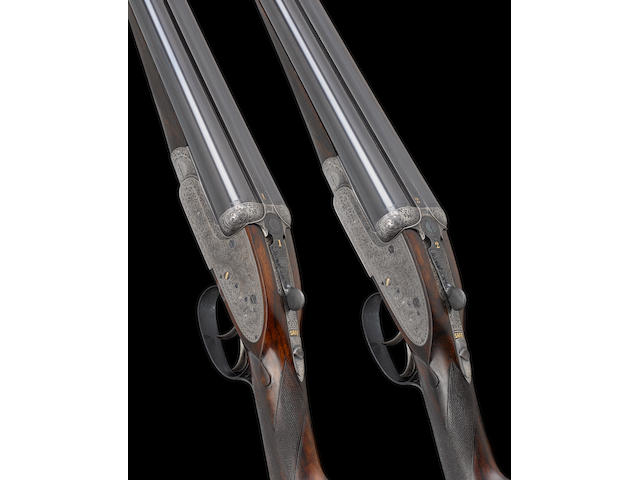 A fine pair of 12-bore 'Royal' sidelock ejector guns by Holland & Holland, no. 23984/5 In their bras